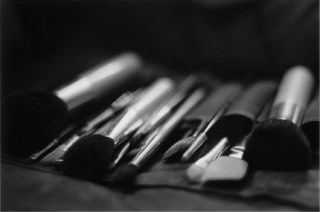 Traditional makeup applied with brushes